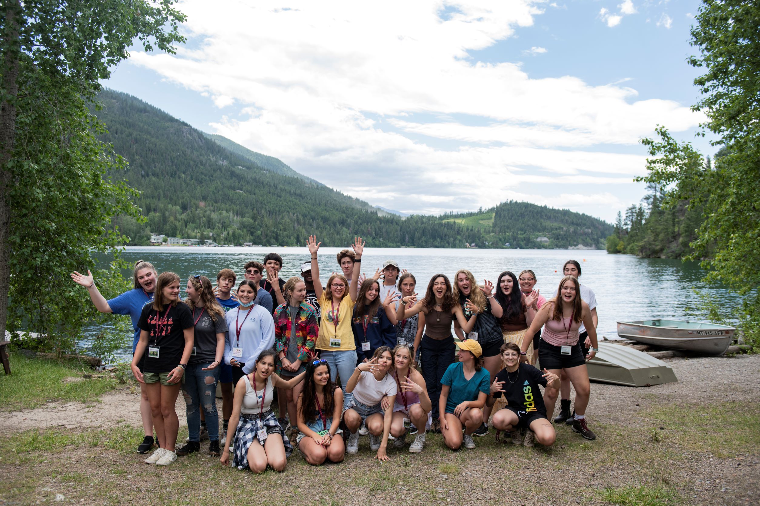 Group of students standing in front of a beautiful Montana scenescape